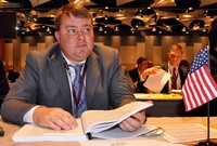 Derek Helms at desk photo